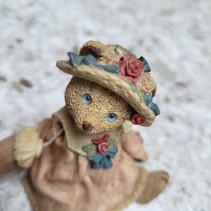 Rare Teddy Figurines with Stringed head and arms.  Striking blue eyese. Numbered